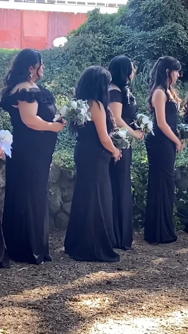 Outdoor wedding ceremony with floral arch